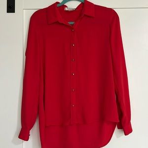 red sheer blouse